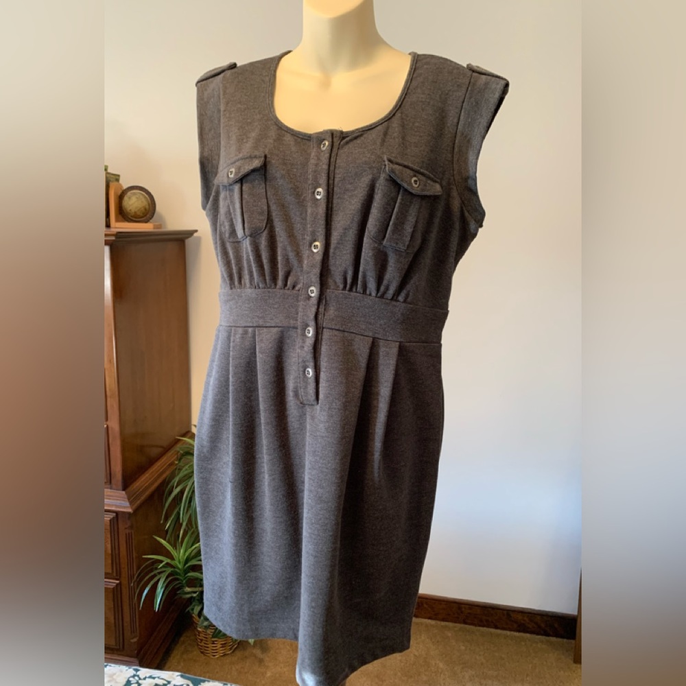 Gray Jumper with sort of an empire waistline.